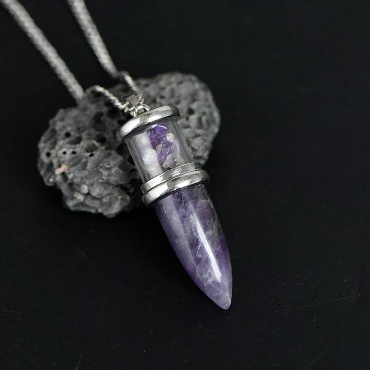 Bullet-shaped stone pendant